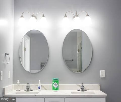 5E 27th St, Baltimore, MD 21218 - bathroom featuring double vanity