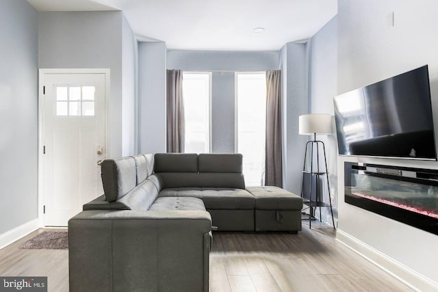 5E 27th St, Baltimore, MD 21218 - living area with wood finished floors and baseboards