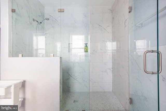 5E 27th St, Baltimore, MD 21218 - bathroom featuring a marble finish shower and vanity