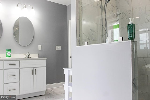 5E 27th St, Baltimore, MD 21218 - bathroom with marble finish flooring, vanity, a tile shower, and baseboards