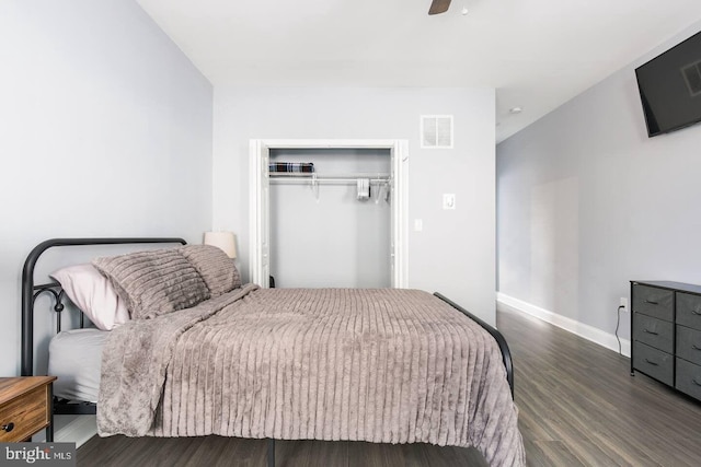 5E 27th St, Baltimore, MD 21218 - bedroom featuring wood finished floors, a closet, baseboards, and a ceiling fan
