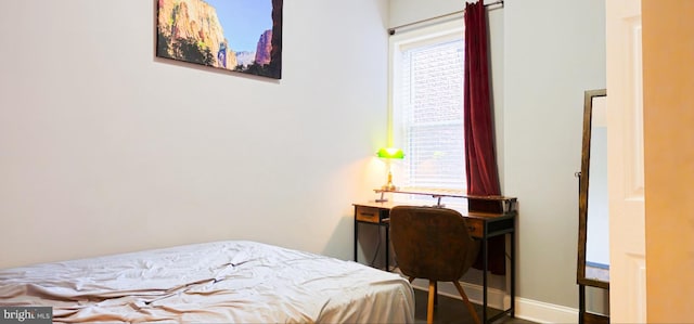 5E 27th St, Baltimore, MD 21218 - bedroom with multiple windows and baseboards