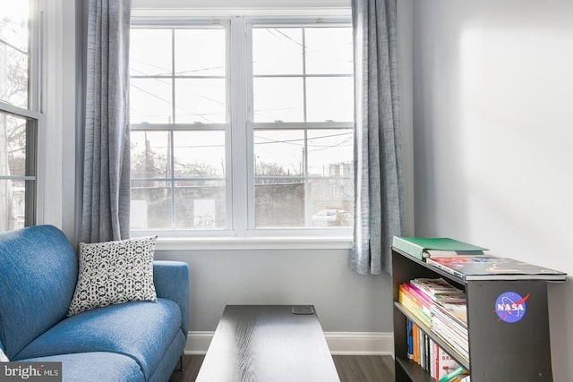 5E 27th St, Baltimore, MD 21218 - sitting room featuring baseboards, wood finished floors, and plenty of natural light
