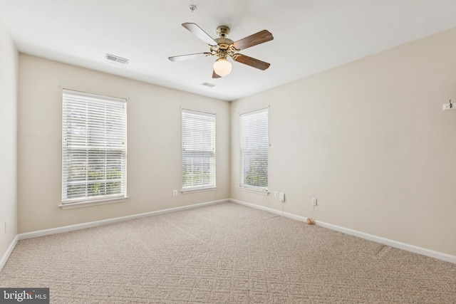 25272 Riffleford Sq Unit 104, Chantilly, VA 20152 - carpeted spare room featuring baseboards and ceiling fan