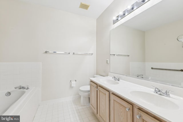 25272 Riffleford Sq Unit 104, Chantilly, VA 20152 - full bathroom featuring a bath, double vanity, tile patterned floors, toilet, and baseboards