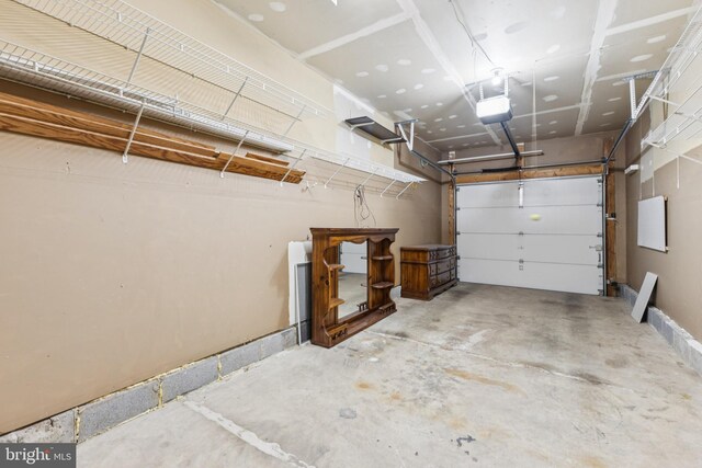 25272 Riffleford Sq Unit 104, Chantilly, VA 20152 - garage with a garage door opener