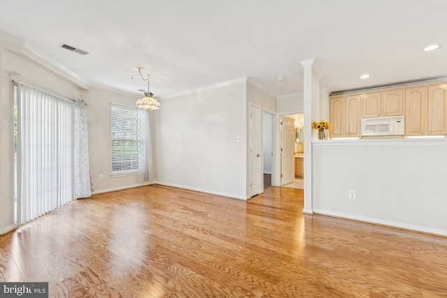 25272 Riffleford Sq Unit 104, Chantilly, VA 20152 - unfurnished living room featuring ornamental molding, light wood-type flooring, recessed lighting, baseboards, and a chandelier