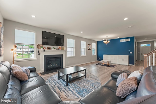 2042 Morgan Creek Dr, Quakertown, PA 18951 - living room with healthy amount of natural light, a chandelier, recessed lighting, and light wood-style flooring