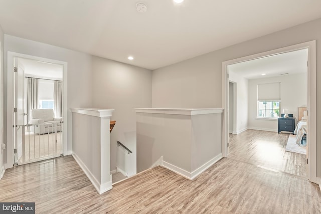 2042 Morgan Creek Dr, Quakertown, PA 18951 - hallway featuring an upstairs landing, wood finished floors, baseboards, and recessed lighting