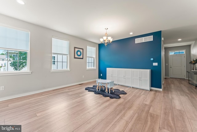 2042 Morgan Creek Dr, Quakertown, PA 18951 - workout room with light wood-style flooring, a chandelier, plenty of natural light, baseboards, and recessed lighting