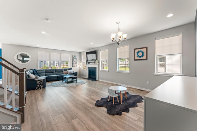 2042 Morgan Creek Dr, Quakertown, PA 18951 - living area featuring healthy amount of natural light, stairway, light wood-style flooring, a chandelier, and recessed lighting