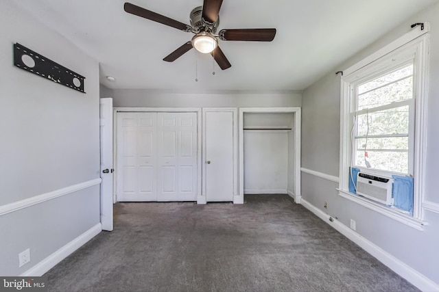 9112 3rd St, Lanham, MD 20706 - unfurnished bedroom featuring multiple closets, carpet flooring, cooling unit, ceiling fan, and baseboards