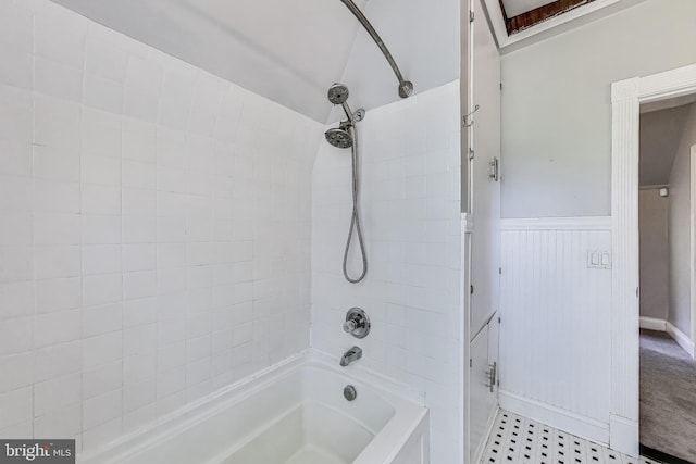 9112 3rd St, Lanham, MD 20706 - bathroom with shower / washtub combination, wainscoting, and tile patterned floors