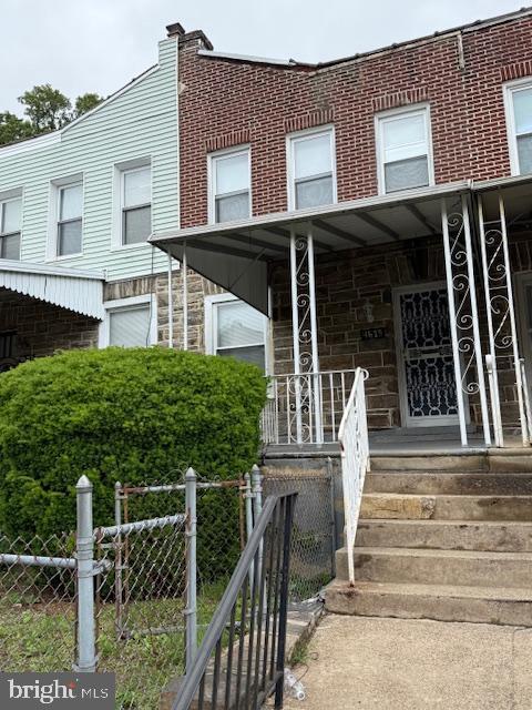 4615 Fernhill Rd, Philadelphia, PA 19144 - view of front of home featuring a porch and stone siding