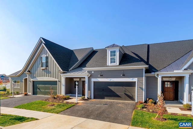 3 Farrow Ter, Charlottesville, VA 22901 - view of front of house featuring asphalt driveway, a standing seam roof, an attached garage, and board and batten siding
