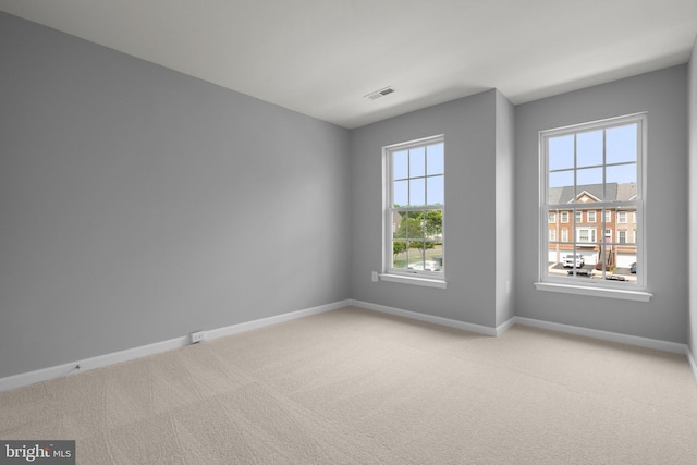 17504 Cajun Ct, Dumfries, VA 22025 - unfurnished room featuring baseboards and light colored carpet