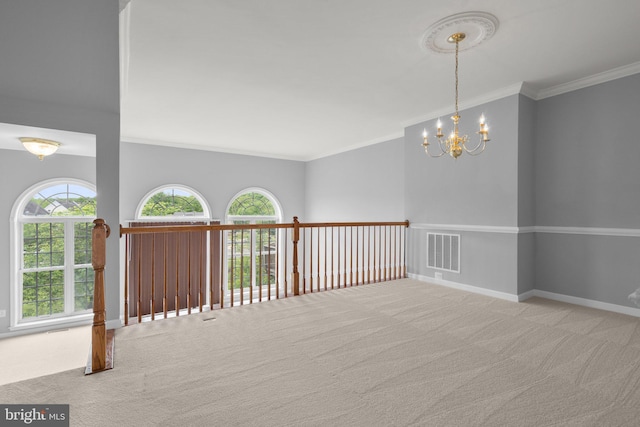 17504 Cajun Ct, Dumfries, VA 22025 - carpeted empty room featuring ornamental molding, a chandelier, and baseboards