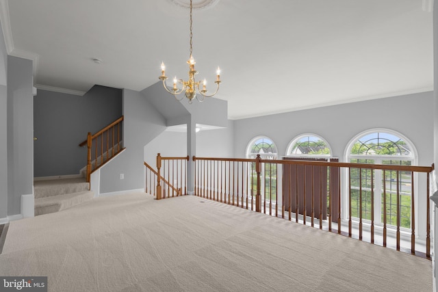 17504 Cajun Ct, Dumfries, VA 22025 - unfurnished room featuring carpet flooring, crown molding, a chandelier, plenty of natural light, and baseboards
