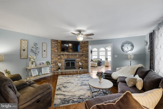 109 Johnson Ave, Oaklyn, NJ 08107 - living area with ceiling fan, wood finished floors, and a stone fireplace