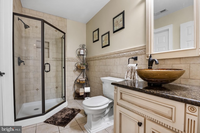 109 Johnson Ave, Oaklyn, NJ 08107 - bathroom featuring vanity, toilet, tile patterned flooring, a shower stall, and tile walls