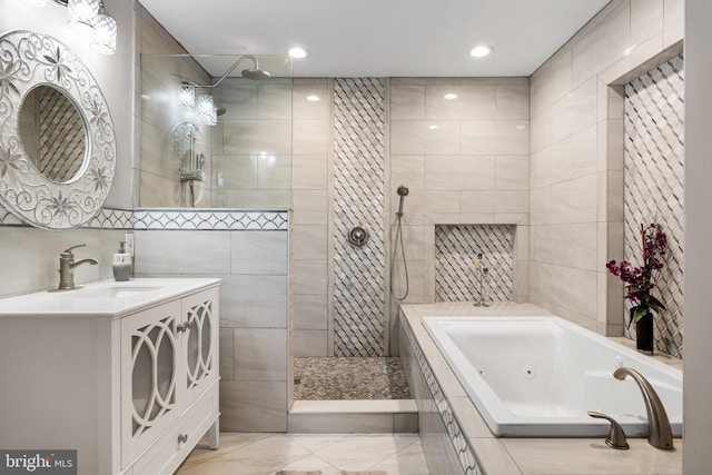 109 Johnson Ave, Oaklyn, NJ 08107 - bathroom with a whirlpool tub, tile walls, walk in shower, vanity, and recessed lighting