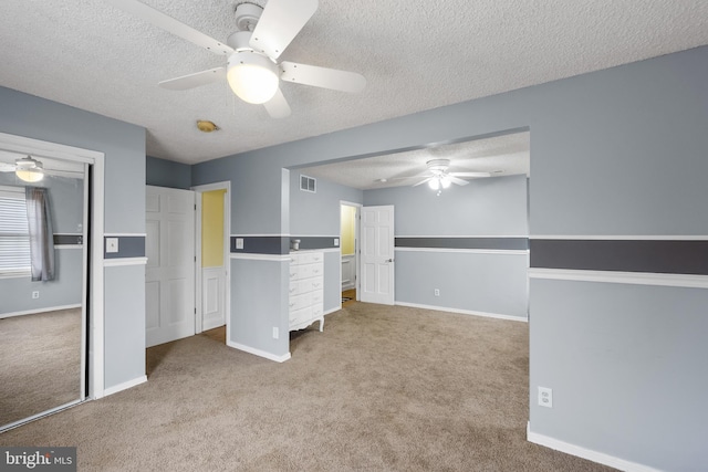109 Johnson Ave, Oaklyn, NJ 08107 - unfurnished bedroom with carpet flooring, a textured ceiling, a closet, baseboards, and a ceiling fan