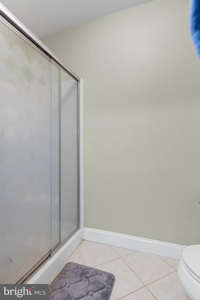 109 Johnson Ave, Oaklyn, NJ 08107 - bathroom featuring baseboards, a shower stall, toilet, and tile patterned floors