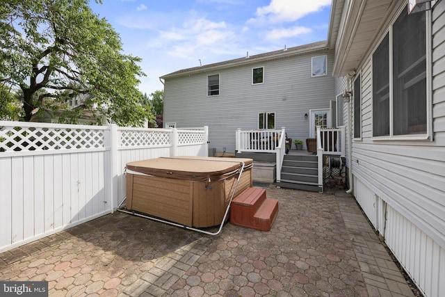 109 Johnson Ave, Oaklyn, NJ 08107 - fenced backyard with a hot tub, a patio area, and a deck