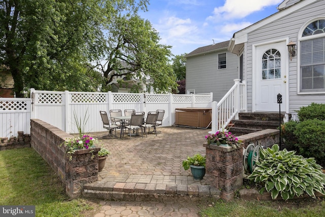 109 Johnson Ave, Oaklyn, NJ 08107 - view of patio / terrace featuring a hot tub, outdoor dining space, and entry steps