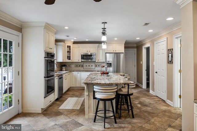 109 Johnson Ave, Oaklyn, NJ 08107 - kitchen featuring cream cabinetry, appliances with stainless steel finishes, baseboards, tasteful backsplash, and crown molding