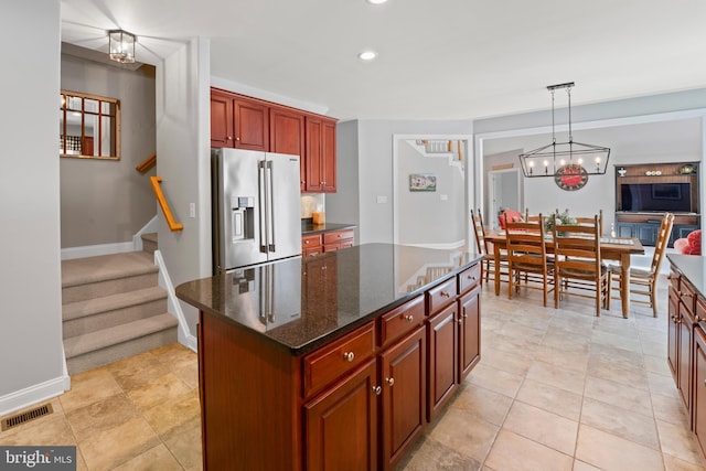 33 Waterview Dr, Pilesgrove, NJ 08098 - kitchen with high end fridge, a chandelier, recessed lighting, baseboards, and a center island