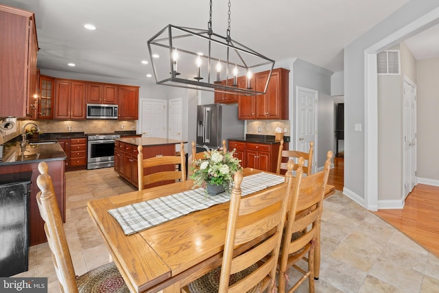 33 Waterview Dr, Pilesgrove, NJ 08098 - dining room with a chandelier, recessed lighting, and baseboards