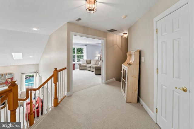 33 Waterview Dr, Pilesgrove, NJ 08098 - corridor with carpet floors, a skylight, an upstairs landing, and baseboards