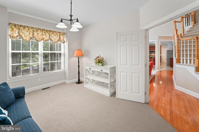 33 Waterview Dr, Pilesgrove, NJ 08098 - sitting room featuring a chandelier, baseboards, and light wood-type flooring