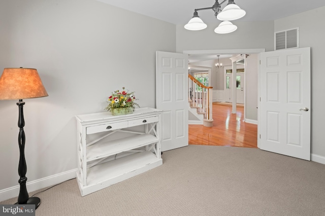 33 Waterview Dr, Pilesgrove, NJ 08098 - hall with a chandelier, carpet flooring, stairway, and baseboards