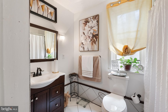 1419 Ellsworth St, Philadelphia, PA 19146 - bathroom featuring vanity, toilet, and tile patterned flooring