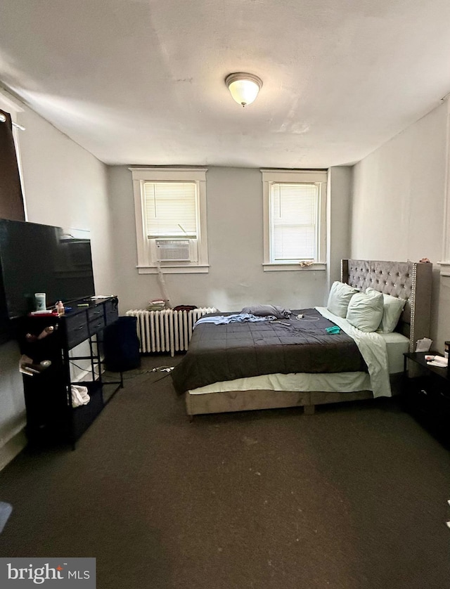 6412 N Sydenham St, Philadelphia, PA 19126 - bedroom with radiator, carpet floors, and cooling unit