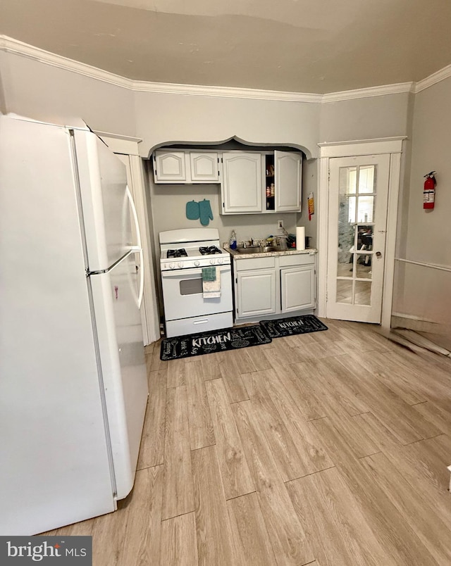 6412 N Sydenham St, Philadelphia, PA 19126 - kitchen featuring white appliances, ornamental molding, and light wood finished floors