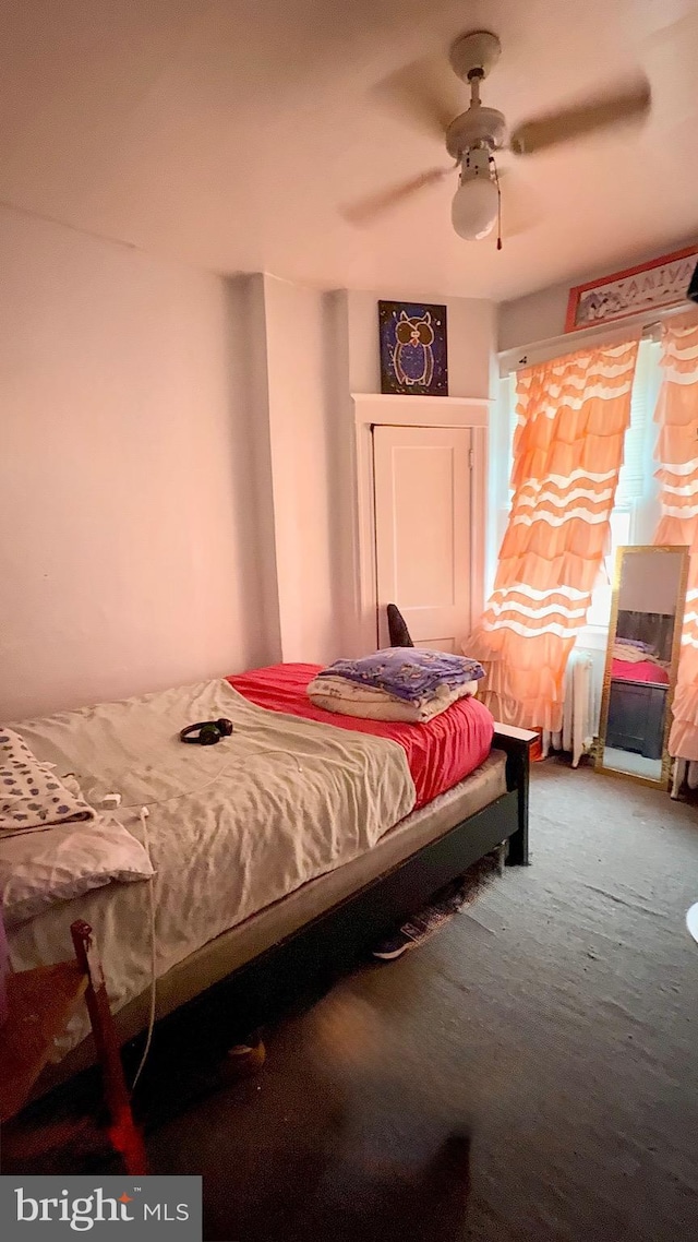 6412 N Sydenham St, Philadelphia, PA 19126 - bedroom with carpet, a ceiling fan, and radiator heating unit
