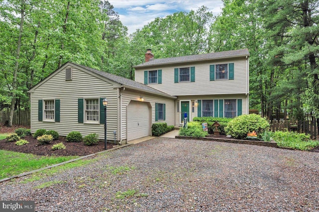 20 Laurel Dr, Tabernacle, NJ 08088 - colonial home with a garage, a chimney, and gravel driveway