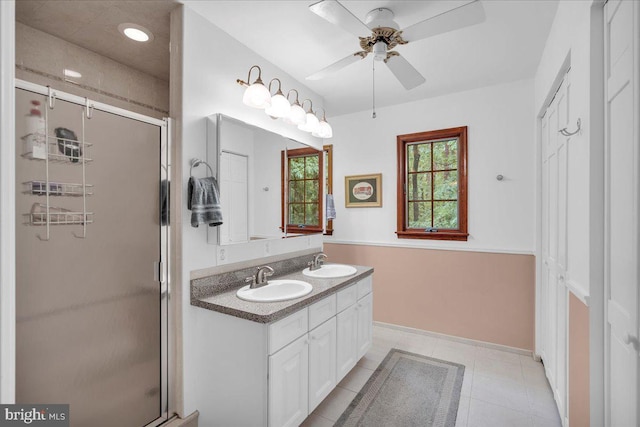 20 Laurel Dr, Tabernacle, NJ 08088 - full bathroom featuring double vanity, a ceiling fan, a stall shower, baseboards, and tile patterned floors
