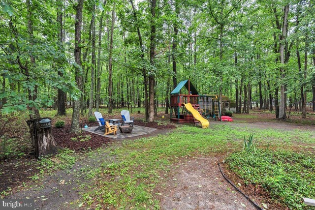 20 Laurel Dr, Tabernacle, NJ 08088 - view of yard featuring a playground and an outdoor fire pit