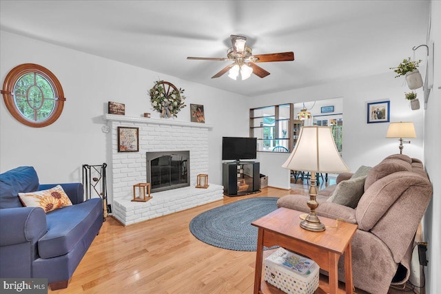 20 Laurel Dr, Tabernacle, NJ 08088 - living room with a ceiling fan, wood finished floors, and a brick fireplace