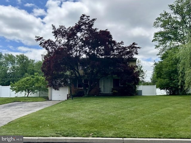1590 Daws Rd, Blue Bell, PA 19422 - view of property hidden behind natural elements with concrete driveway and a garage