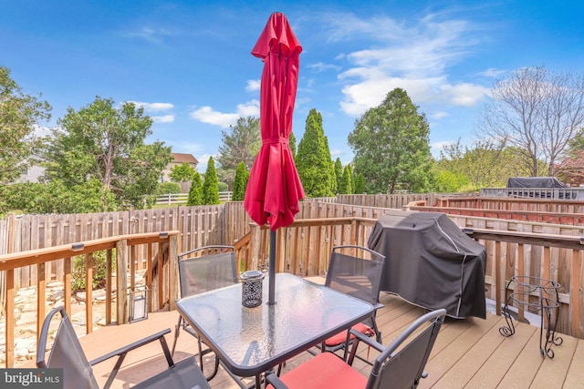 6 Victoria Sq, Frederick, MD 21702 - wooden terrace with a fenced backyard, outdoor dining area, and grilling area