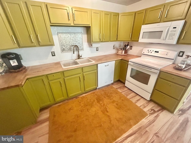 415 Rolly Rd, Mount Jackson, VA 22842 - kitchen with white appliances, a sink, green cabinets, wood counters, and light wood-style flooring
