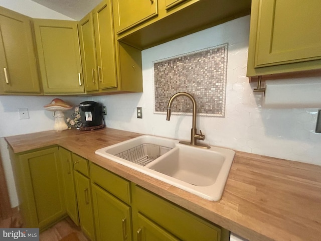 415 Rolly Rd, Mount Jackson, VA 22842 - kitchen with wood counters, green cabinets, and a sink