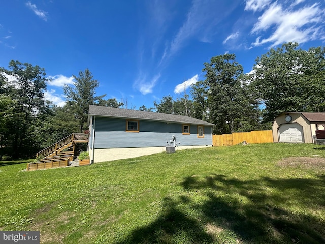 415 Rolly Rd, Mount Jackson, VA 22842 - rear view of property with a garage and stairs