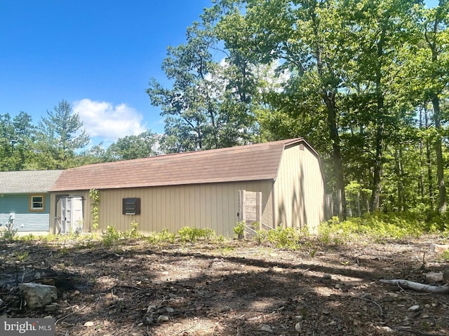 415 Rolly Rd, Mount Jackson, VA 22842 - view of home's exterior with roof with shingles, a gambrel roof, and an outdoor structure