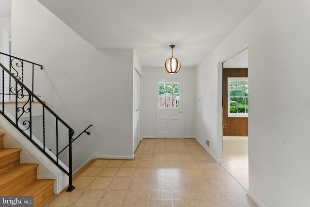 13021 Morningside Ln, Silver Spring, MD 20904 - foyer entrance featuring stairway, baseboards, and light flooring